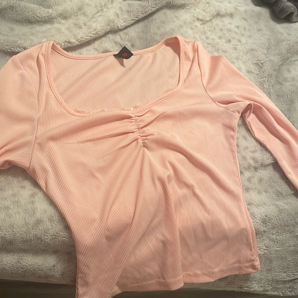 Pink tight fitted shirt